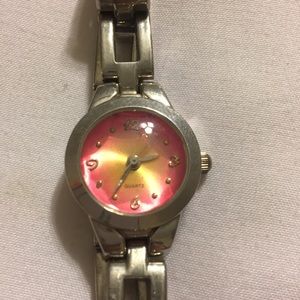Silver watch with a pink and yellow face